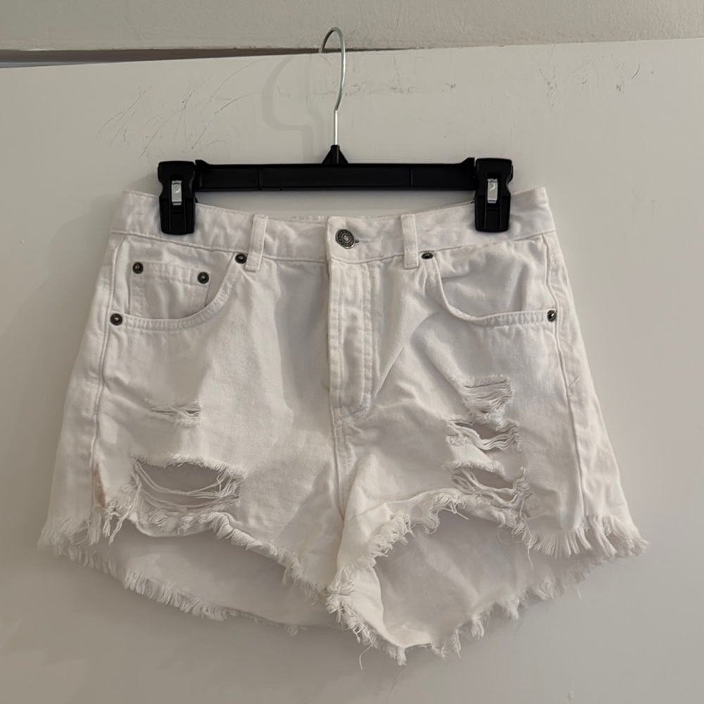 Subdued size 29 White Distressed Denim Shorts. Excellent condition.